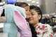 Guatemalan mother Sara Caal presses her 5-year-old daughter's cheek against her as they reunite on Feb. 21 at George Bush Intercontinental Airport. Caal and her daughter Alida were separated at the Texas-Mexico border last summer.