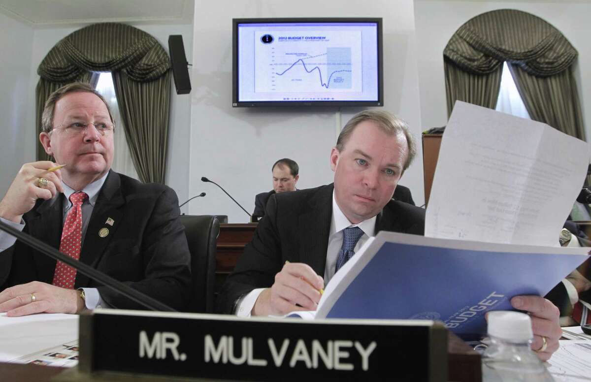 Rep. Bill Flores, R-Waco, at a hearing with then- Rep. Mick Mulvaney, R-S.C., now acting chief of staff to President Donald Trump. Nowadays, Flores can be found telling other members of the House Energy committee about the solar system he installed on his roof and advocating for a market-driven approaches to climate change such asinvesting in batteries and other clean energy technology rather than regulating emissions