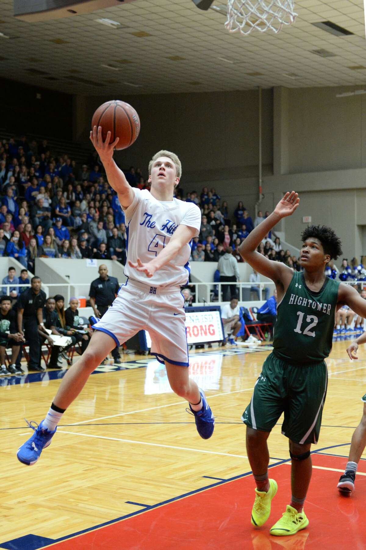 Max Armer (4) of Barbers Hill drives to the basket during the first half of a Class 5A, Region III area-round basketball playoff game between the Hightower Hurricanes and the Barbers Hill Eagles on Thursday, February 21, 2019 at the Phillips Field House, Pasadena, TX.
