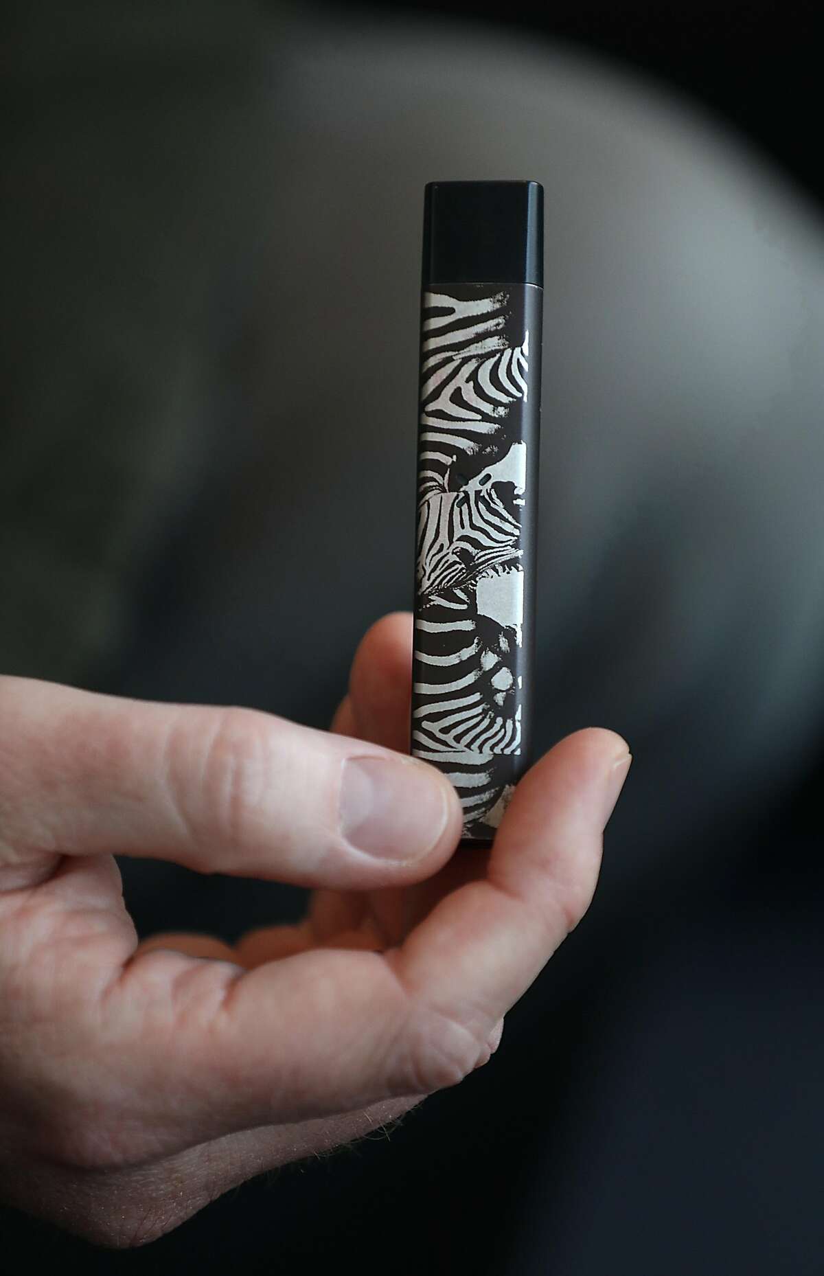 Pax VP partner Nick Dor shows his Pax Era vaporizer used for cartridges with marijuana concentrates on Tuesday, Feb. 19, 2019, in San Francisco, Calif.