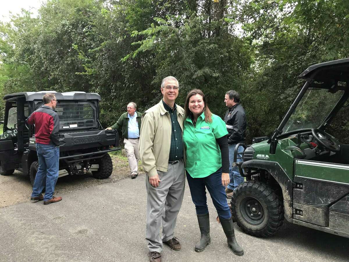 Marlin Williford and Wendy Duncan, co-founders of Barker Flood Prevention, tour the Barker Reservoir with other BFP members and officials of the U.S. Army Corps of Engineers.