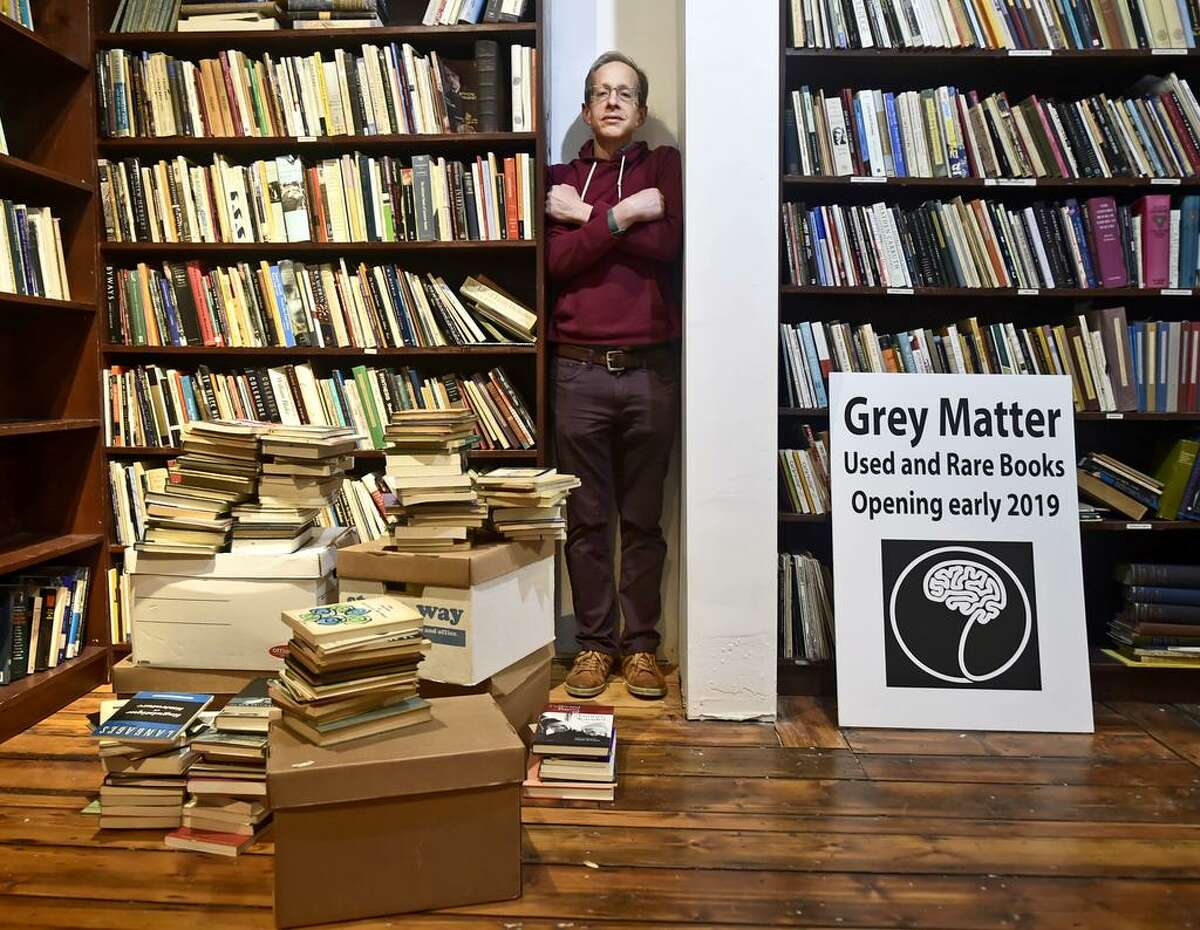 New Haven, Connecticut - Monday, February 18, 2019: Sam Burton, of Hadley, Ma., is opening up Grey Matter, a store selling used and rare books, at 264 York Street in New Haven.