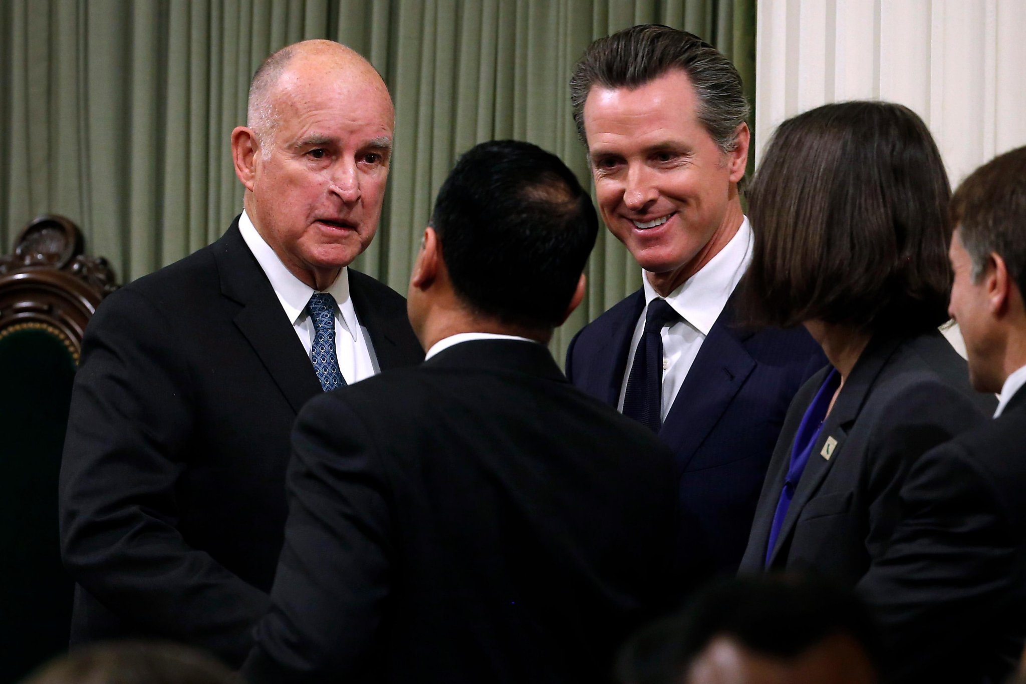California Gov. Gavin Newsom puts distance between himself and Jerry Brown