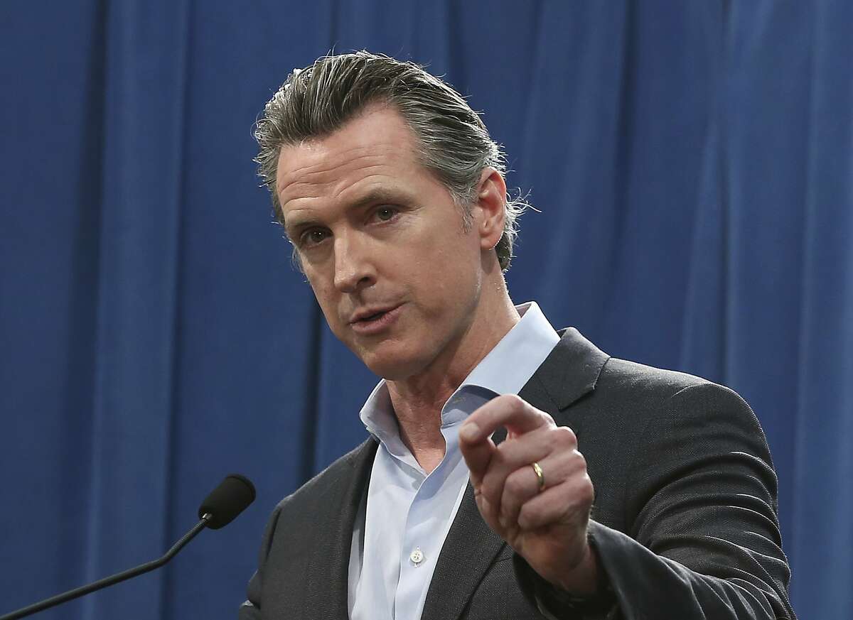 California Gov. Gavin Newsom discusses his decision to withdraw most of the National Guard troops from the nation's southern border and changing their mission, during a Capitol news conference Monday, Feb. 11, 2019, in Sacramento, Calif. (AP Photo/Rich Pedroncelli)