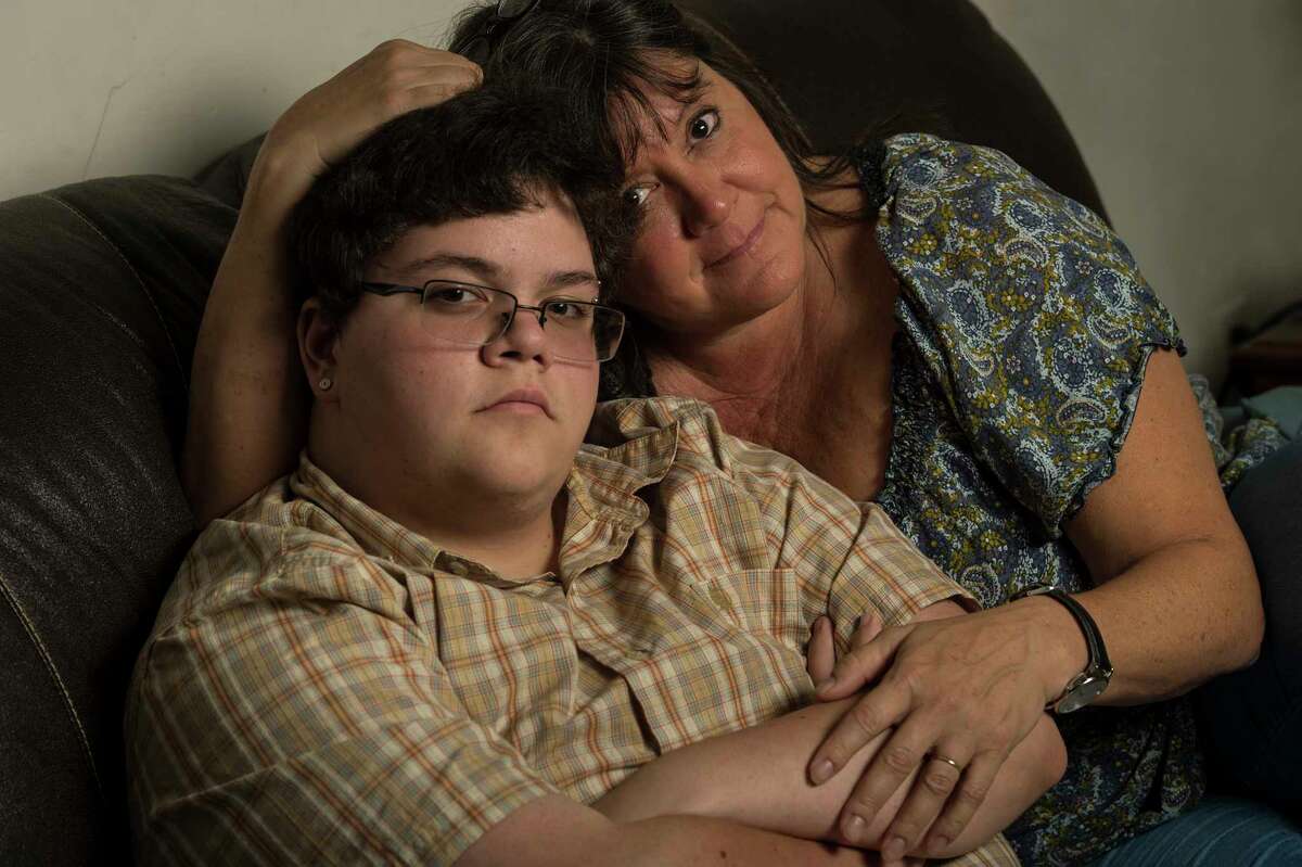 Gavin Grimm with his mother, Deirdre Grimm, in 2016. The transgender teen sued the Gloucester County School Board in Virginia after it barred him from the boys' bathroom.