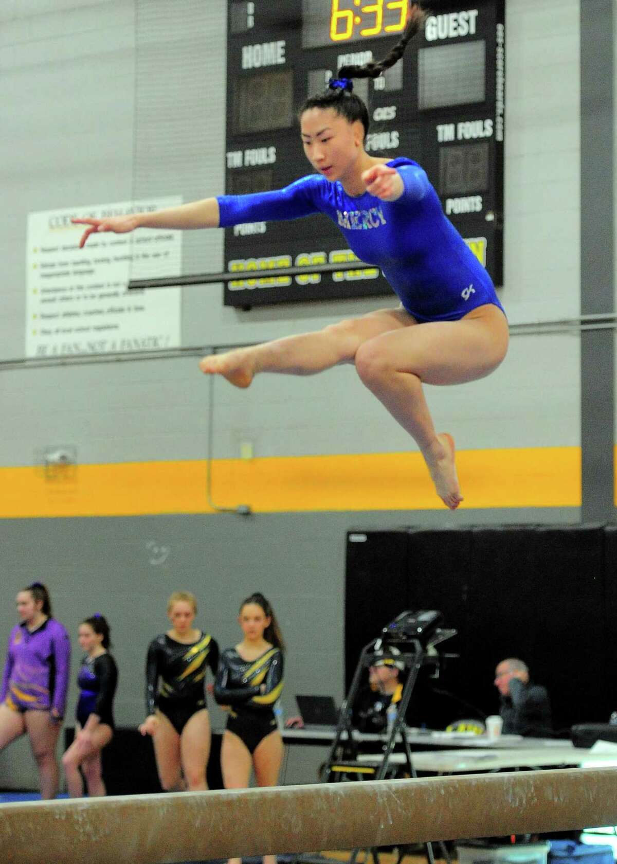 Woodstock Academy gymnastics earns ninth straight Class S/Class M title