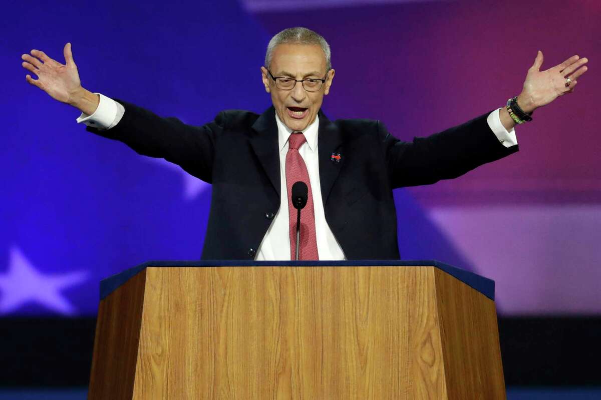 In this Nov. 9, 2016, file photo, John Podesta, campaign chairman, announces that Democratic presidential nominee Hillary Clinton will not be making an appearance at Jacob Javits Center in New York, as the votes are still being counted. (AP Photo/Patrick Semansky, File)