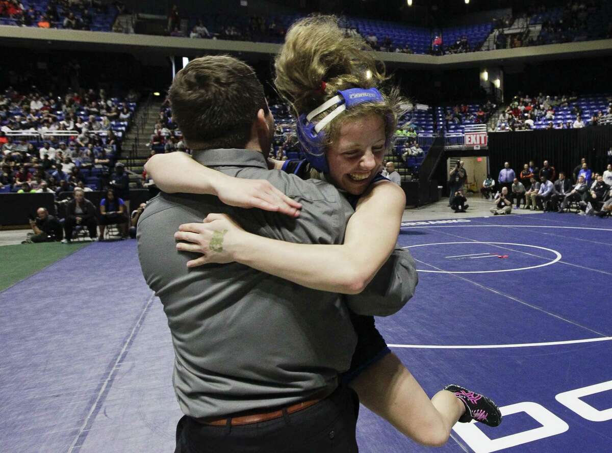 Amanda Mcaleavey of Cypress Creek reacts after defeating Adia Ronda of Keller Central to win the Class 6A girls 110-pound finals during the UIL State Wrestling Championships at the Berry Center, Saturday, Feb. 23, 2019, in Cypress.