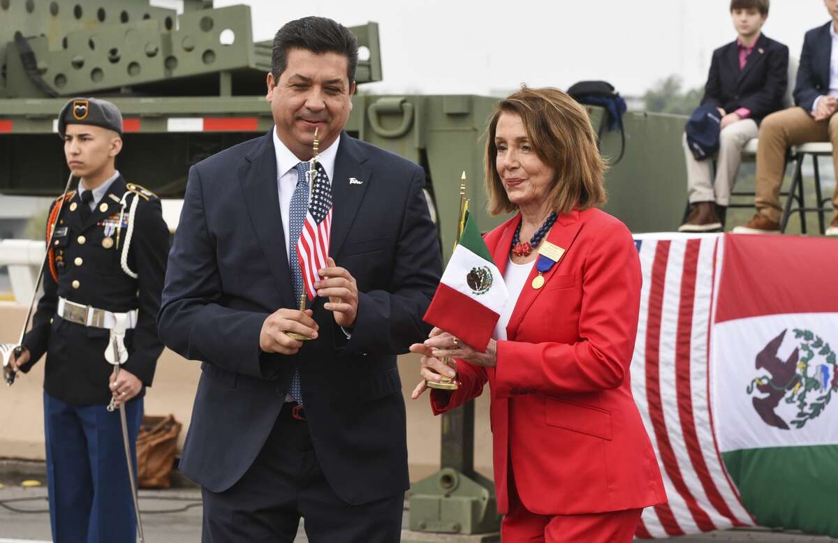 Governor of the Mexican state of Tamaulipas Honorable Mr. Francisco Garcia Cabeza De Vaca and U.S. Speaker of the House Nancy Pelosi meet at the middle of Juarez-Lincoln International Bridge on Saturday, Feb. 23, 2019, during the WBCA International Good Neighbor Council International Bridge Ceremony sponsored by La Posada Hotel.