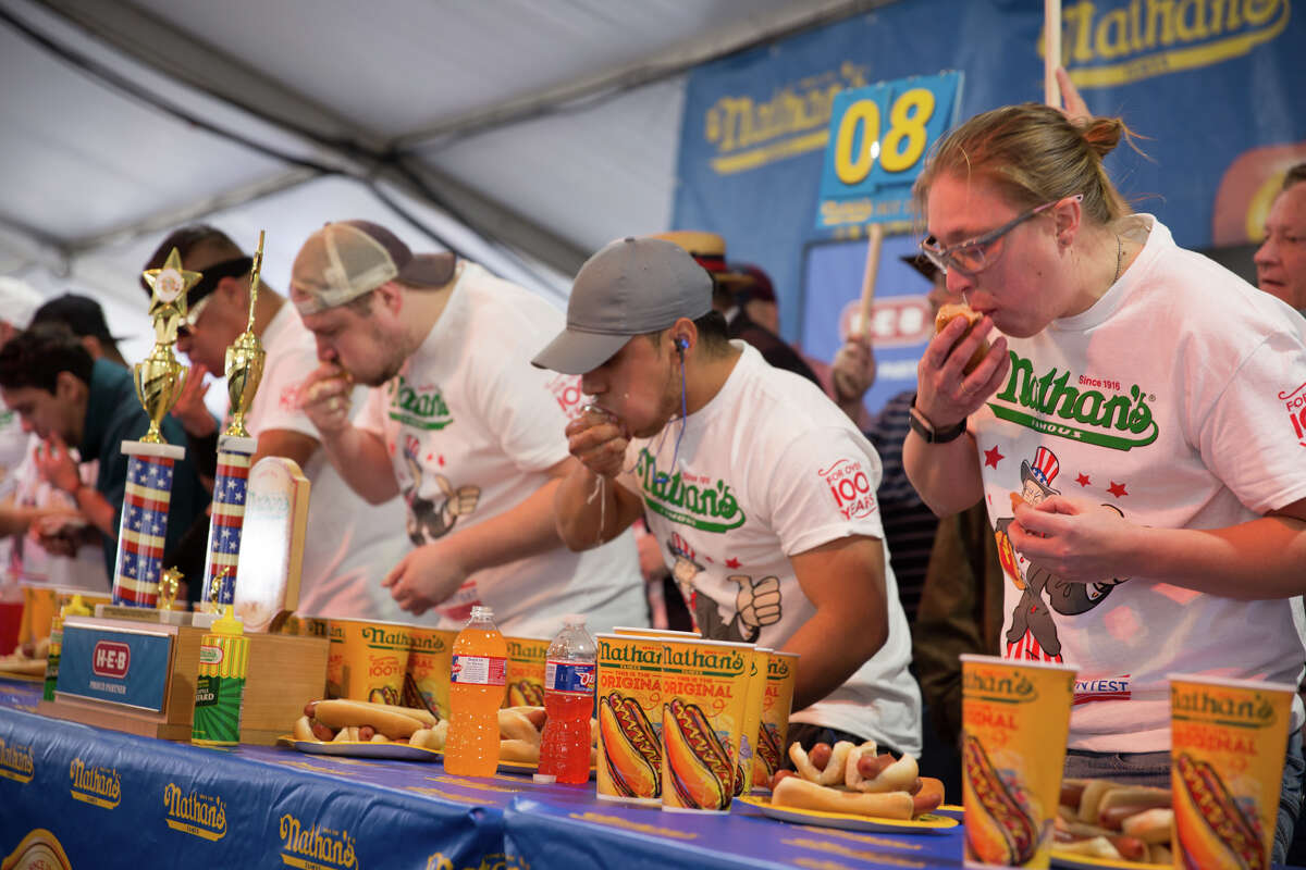 San Antonians competed for a shot at food glory at the hot dog-eating contest at the San Antonio Stock Show & Rodeo on Saturday, Feb. 23, 2019. Nathan’s Famous, in a partnership with H-E-B, hosted its Texas qualifier for Fourth of July International Hot Dog Eating Contest in Brooklyn’s Coney Island.