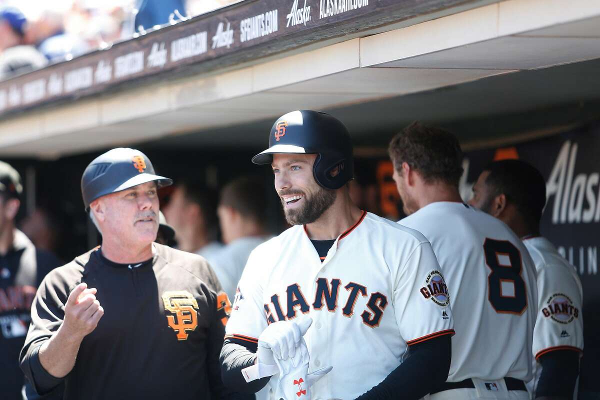 Mac Williamson (51) is congratulated after a score at the Giants vs. Marlins game at the AT&T Park on Wednesday, June 20, 2018 in San Francisco, Calif.