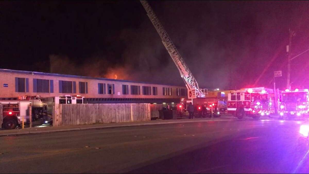 More than 100 San Antonio firefighters and 27 units battle a blaze at the Willow Run Apartments, 7543 South Sea Lane, on the city's North Central Side on Sunday night, Feb. 24, 2019. No one was injured, but two people were rescued after they were trapped by flames and smoke on a second floor. The building sustained significant damage, officials said.