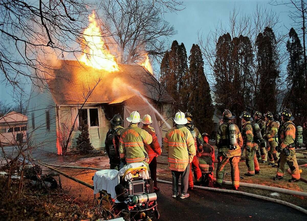 2 brothers killed after being trapped in CT house fire