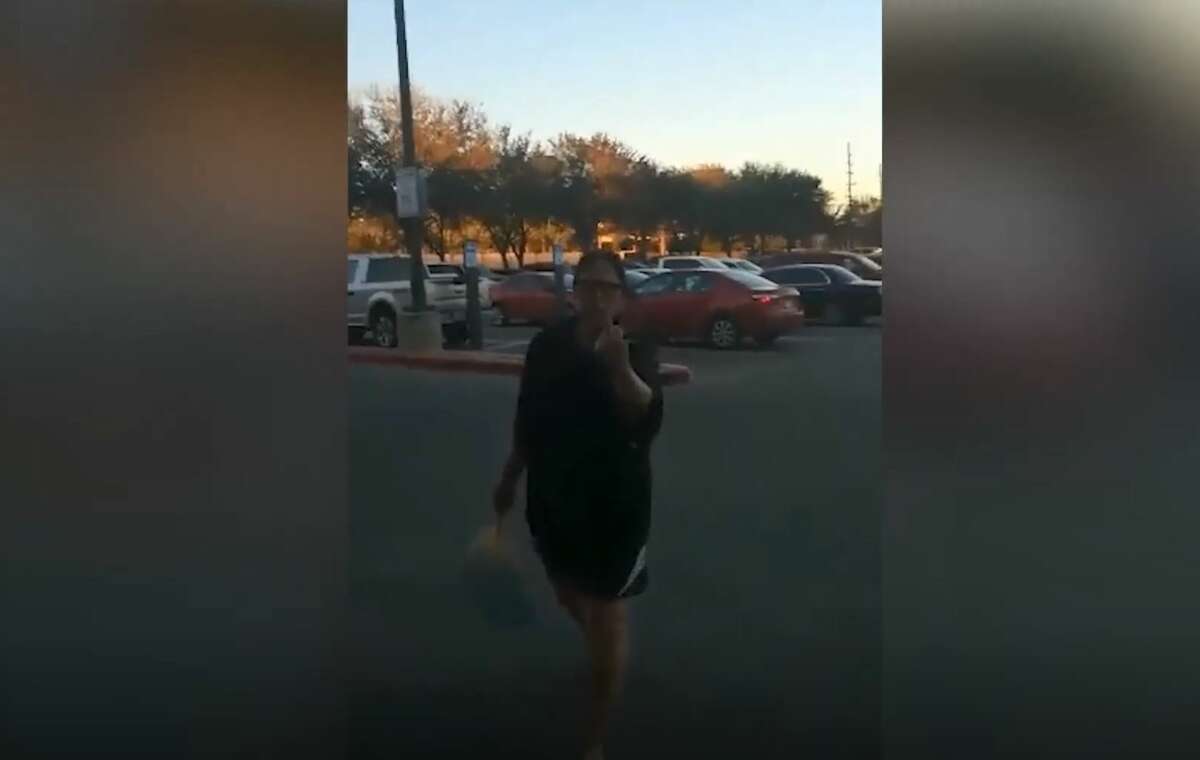 A woman directs explicit insults toward another customer at a Kroger in west Houston.