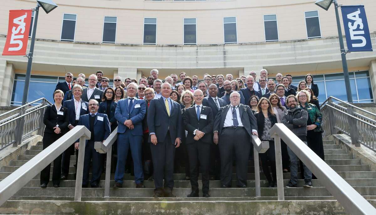 UTSA President Taylor Eighmy, front left, and Dr. Hans Jürgen Prömel, president of Technical University Darmstadt in Germany, pose for a photo with delegates from the City of Darmstadt, Germany and UTSA leaders in front of UTSA's Main Building on Monday, Feb. 25, 2019. The two universities have a partnership accompanying San Antonio's sister city program with Darmstadt, Germany.