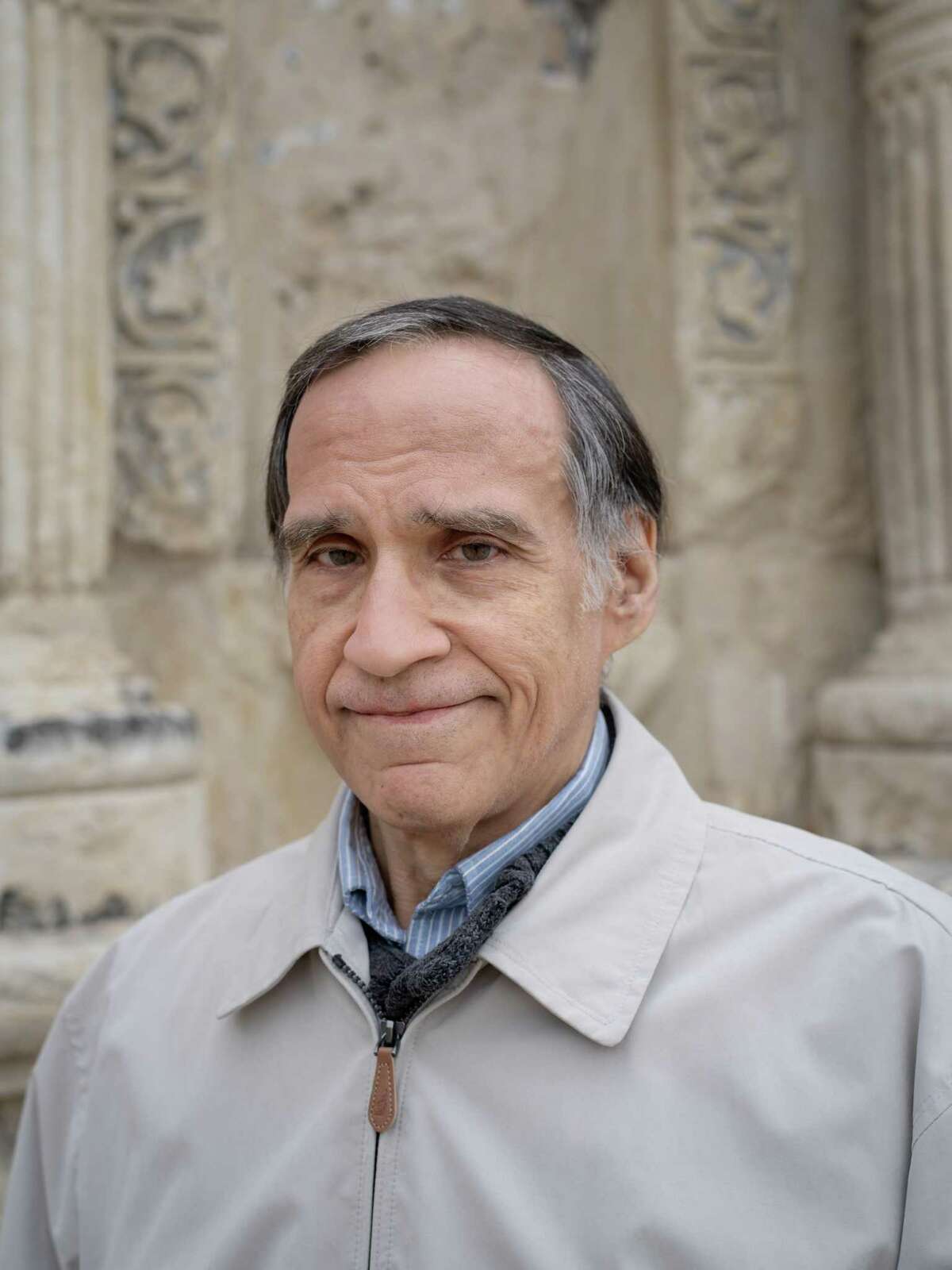 Gary Zaboly, an historical artist and illustrator, poses for a portrait in front of an Alamo niche where statues of saints used to be housed, in Alamo Plaza where representations of his work are displayed on Monday, February 25, 2019. Zaboly has been depicting the Alamo, its occupants, defenders and attackers in his work since the 1990s. Many of his works are owned and displayed in the Alamo's Wall of History on the premises.