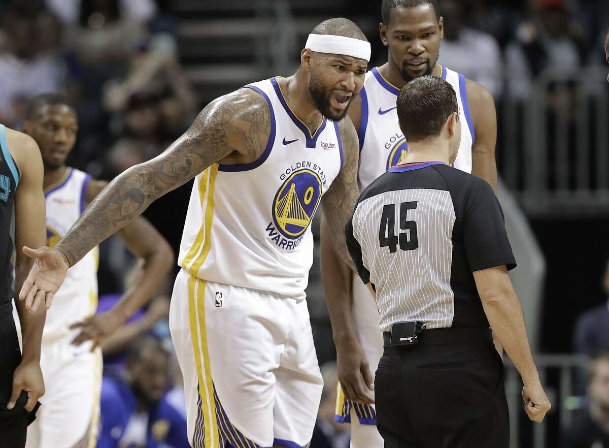 Golden State Warriors' DeMarcus Cousins (0) reacts to being called for a technical foul by referee Brian Forte (45) during the second half of an NBA basketball game against the Charlotte Hornets in Charlotte, N.C., Monday, Feb. 25, 2019. (AP Photo/Chuck Burton)