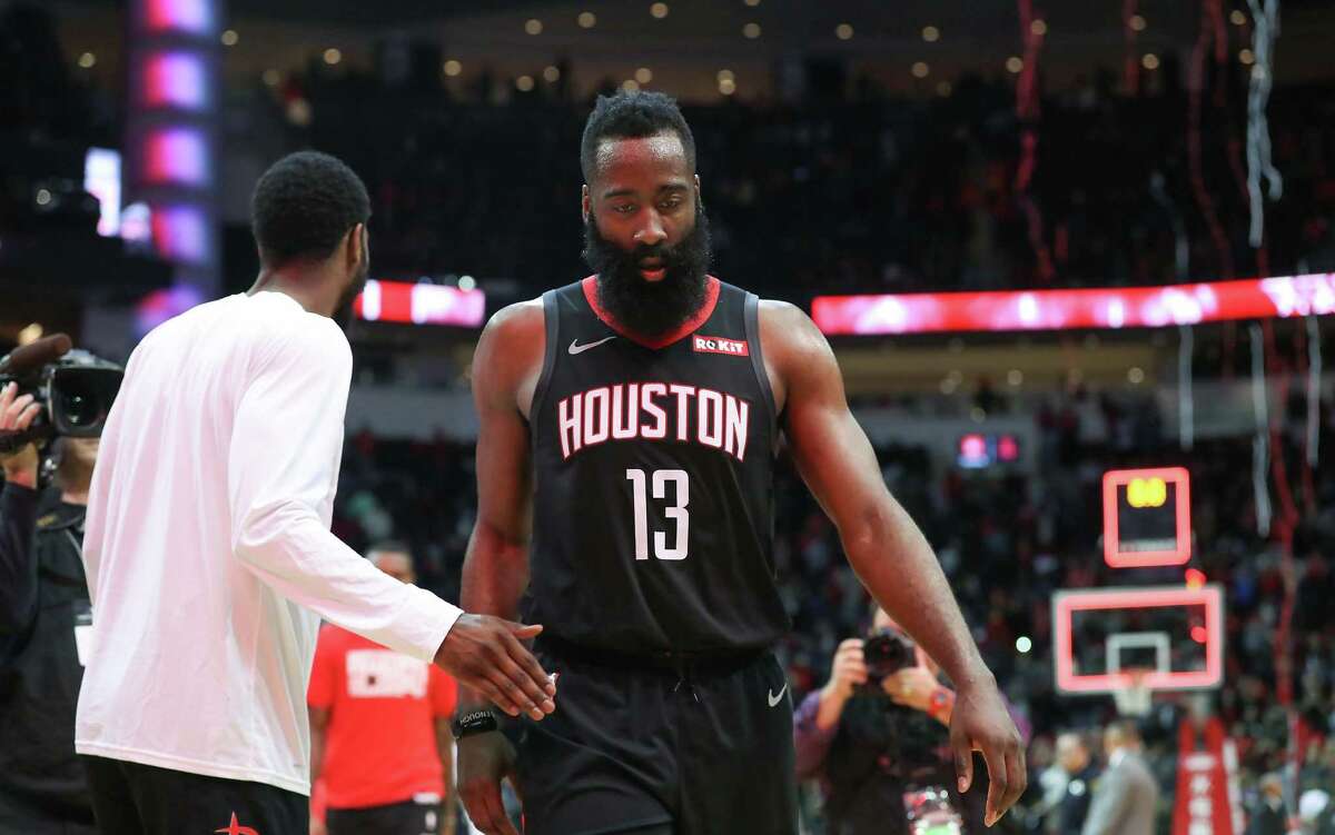 Houston Rockets guard James Harden (13) leaves the court two points shy of scoring 30 points at the end of an NBA basketball game at Toyota Center on Monday, Feb. 25, 2019, in Houston.