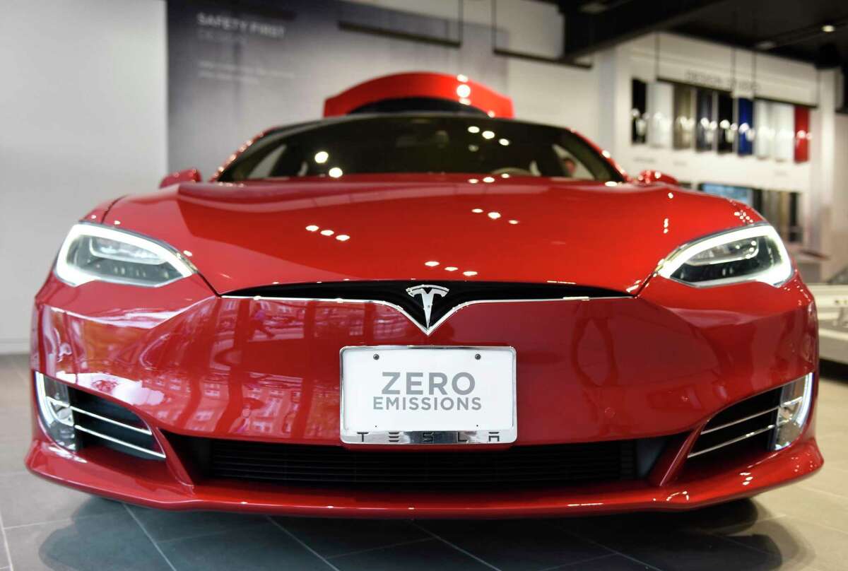 The Model S sedan at the new Tesla gallery on Greenwich Avenue in Greenwich, Conn. Wednesday, Sept. 28, 2016. The gallery displays Tesla's Model S sedan and Model X SUV-crossover, as well as the company's unique battery-lined rolling chassis. Tesla cannot currently sell cars in Connecticut thanks to state franchise laws which prohibit the direct sale of vehicles by auto manufacturers, so the space is used to educate the public about Tesla and the advancement in electric vehicle technology. The gallery opens to a private audience of Connecticut Tesla owners and town leaders Thursday, Oct. 6 and will open to the public Friday, Oct. 7.
