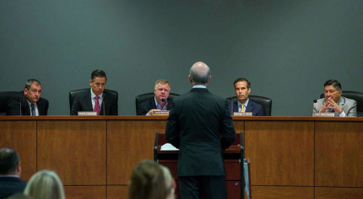 Texas’ School Land Board controls how $10 billion of the state’s $44 billion Permanent School Fund is invested. From right to left are board member Gilbert Burciaga, chairman George P. Bush, board member Scott Rohrman, and staffers Mark Havens, deputy land commissioner and Jeff Gordon, general counsel.