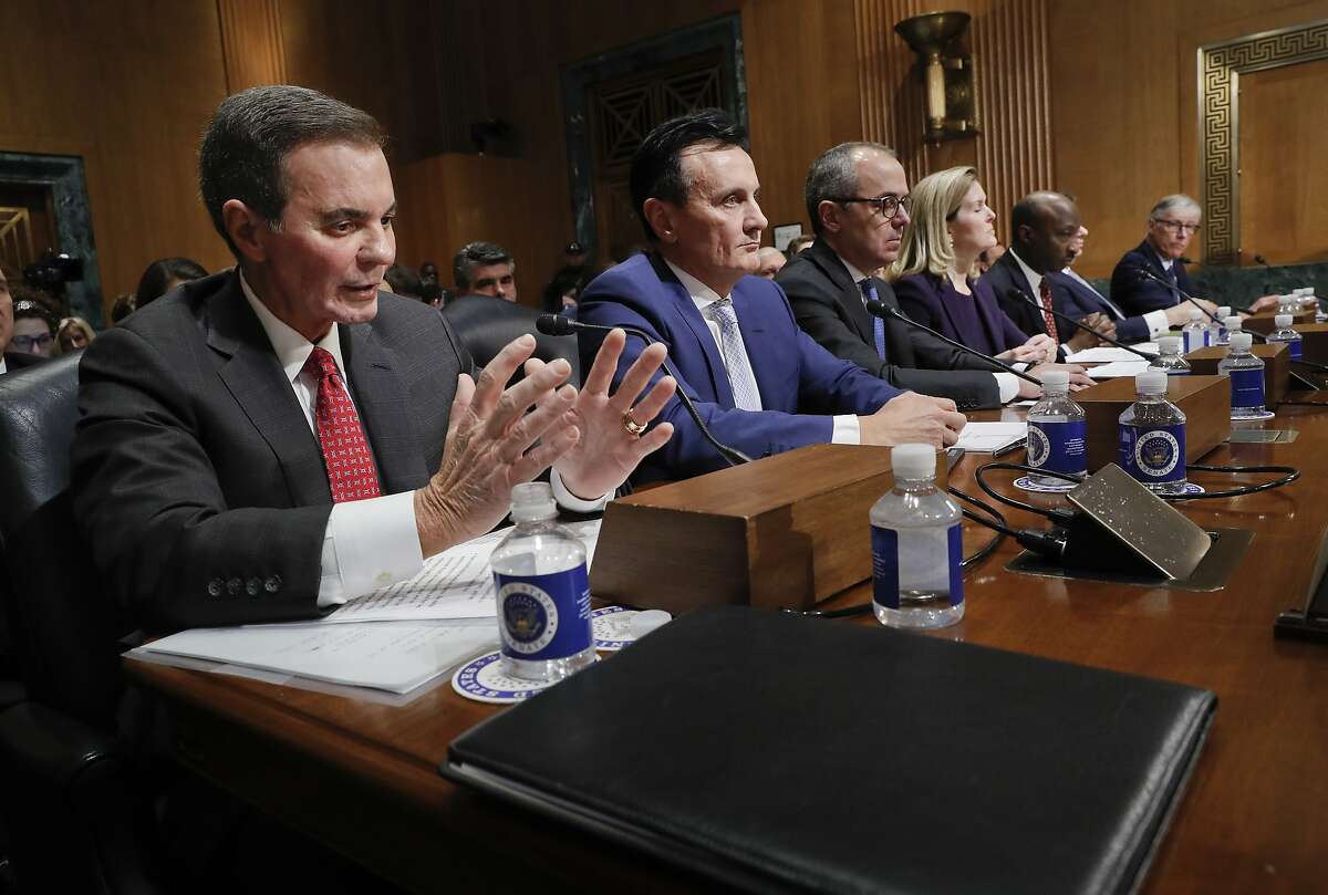 Richard A. Gonzalez, far left, Chairman and Chief Executive Officer AbbVie Inc., testifying before the Senate Finance Committee hearing on drug prices, Tuesday, Feb. 26, 2019 on Capitol Hill in Washington. Sitting with Gonzalez are l-r., Pascal Soriot, Executive Director and Chief Executive Officer AstraZeneca, Giovanni Caforio, M.D. Chairman of the Board and Chief Executive Officer Bristol-Myers Squibb Co., Jennifer Taubert, Executive Vice President, Worldwide Chairman, Janssen Pharmaceuticals Johnson & Johnson, Kenneth C. Frazier, Chairman and Chief Executive Officer Merck & Co., Inc., Albert Bourla, DVM, Ph.D. Chief Executive Office Pfizer, Olivier Brandicourt, M.D. Chief Executive Officer Sanofi. (AP Photo/Pablo Martinez Monsivais)