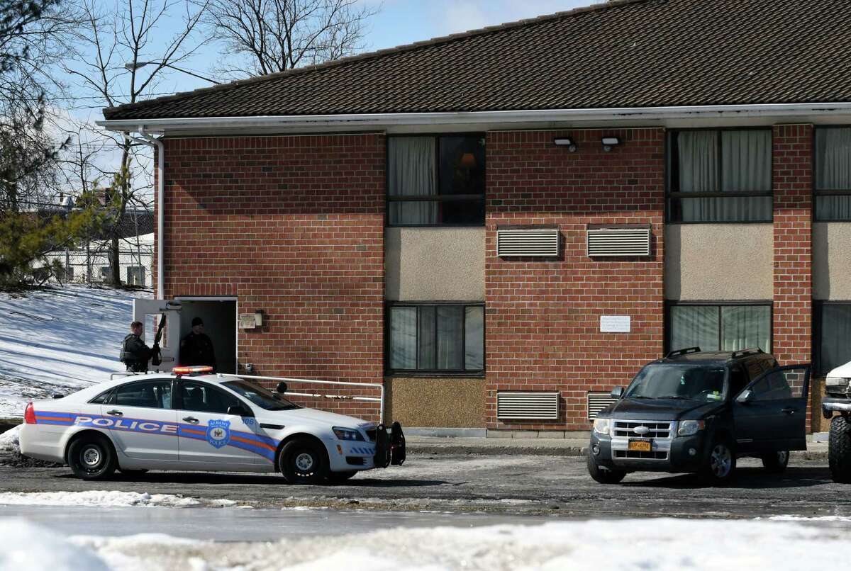 A scene from the rear of a Motel 6 hotel on Watervliet Ave. Ext. on Tuesday, Feb. 26, 2019, in Albany, N.Y. after North Greenbush bank robbery suspects fled to the Motel 6. Albany County Sheriff's deputies allege the motel was also being used for drug sales in November 2020. (Will Waldron/Times Union)