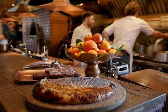 A bowl of fruit seen on the kitchen counter at Chez Panisse as the chefs work on Wednesday, Feb. 20, 2019, in Berkeley, Calif.