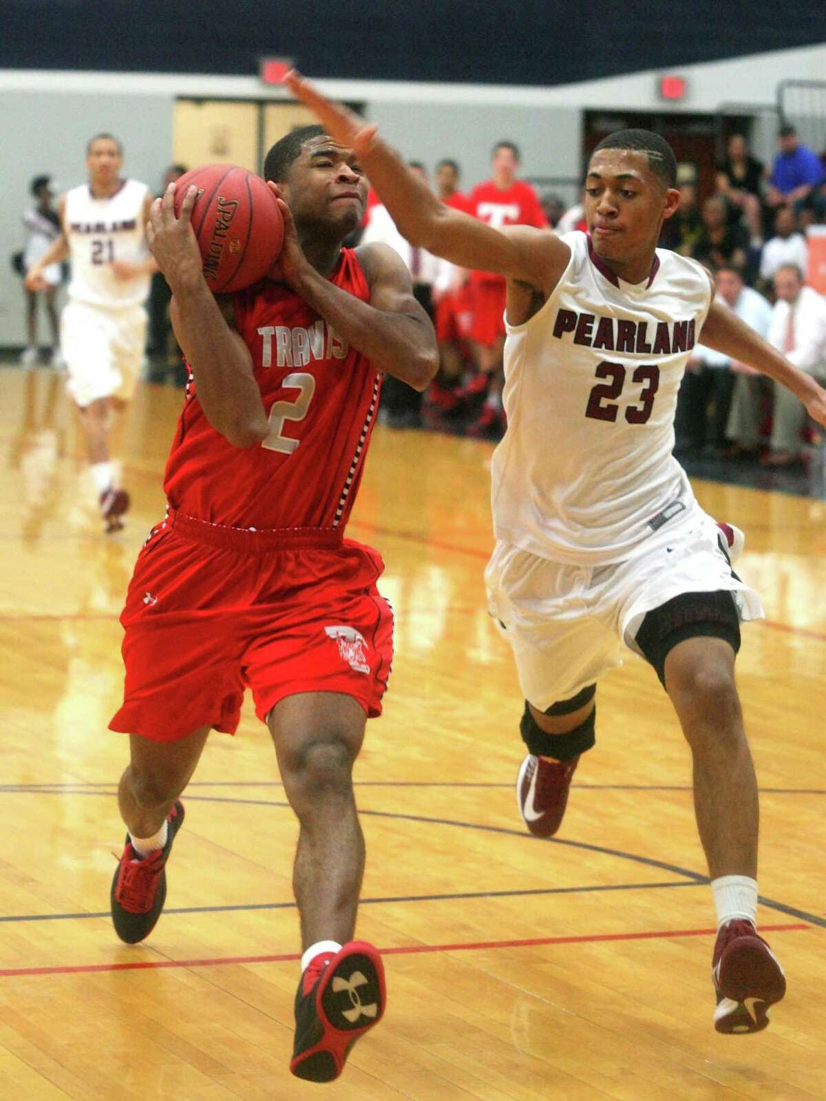 Pearland's Cameron Reynolds, shown in a high school playoff game against Fort Bend Travis, has signed a 10-day contract with the Minnesota Timberwolves.