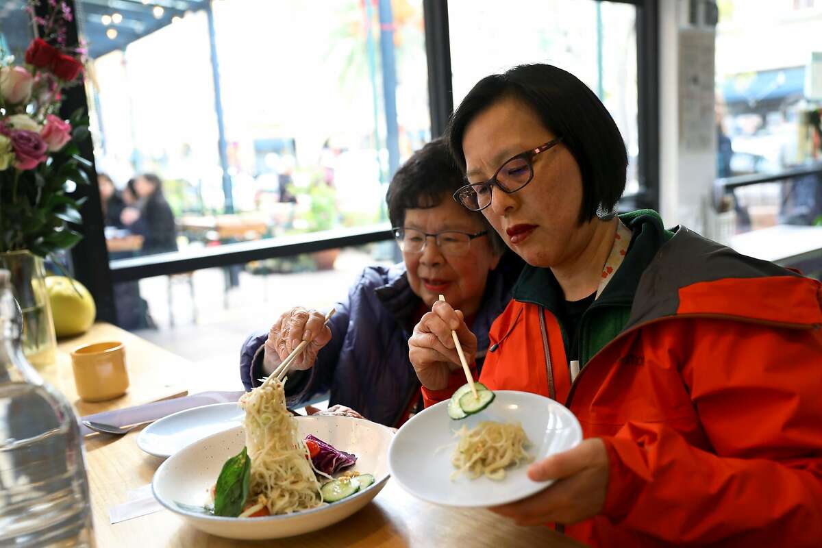 Carolyn Gee (left) lunches with her daughter, Sabrina Gee-Shin, at Cambodian restaurant Nyum Bai, located at 3340 E. 12th St. in Oakland, Calif. on Friday, February 15, 2019.