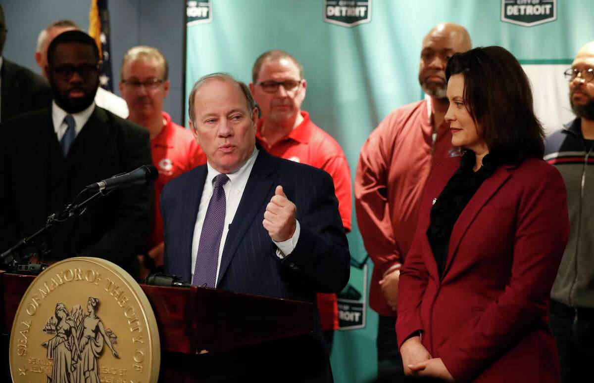 Detroit Mayor Mike Duggan announces plans for Fiat Chrysler to build a new assembly plant include $12 million in tax abatements over a dozen years and 200 acres of land during a news conference in Detroit, Tuesday, Feb. 26, 2019. Duggan's office said that the city will work with the state on other incentives for the automaker's $1.6 billion investment to convert its Mack Avenue Engine Complex into a new facility. The city has 60 days to get the land, 170 acres of which is owned by the city, a power utility, a public water authority and a family of prominent wealthy businessmen. (AP Photo/Carlos Osorio)
