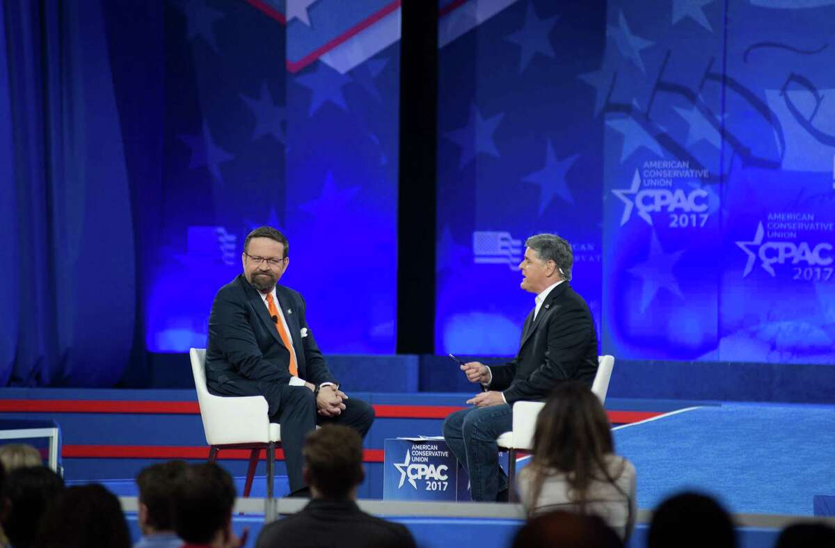 Fox News personality Sean Hannity speaks with former Trump advisor Sebastian Gorka during the Conservative Political Action Conference on Feb. 23, 2017 in National Harbor, Maryland.