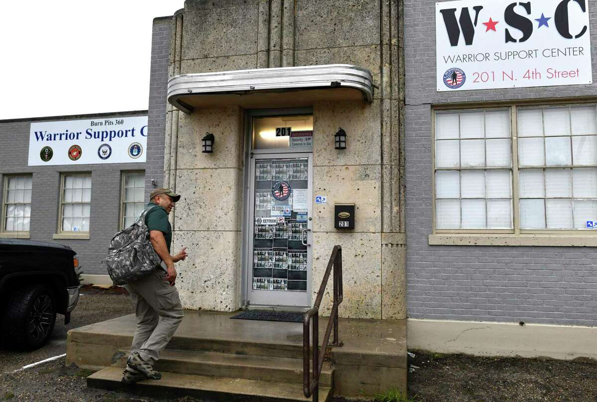 In this file photo, Le Roy Torres, an Iraq war veteran, arrives at the Warrior Support Center in Robstown, Texas, which hosts the offices of Burn Pit 360, an organization founded by Torres and his wife, Rosie. Burn pits were used in Iraq and Afghanistan to burn trash, including batteries, tires, human and medical waste. Torres suffers has trouble with his memory, perception and emotions, which he attributes to proximity to the burn pits.