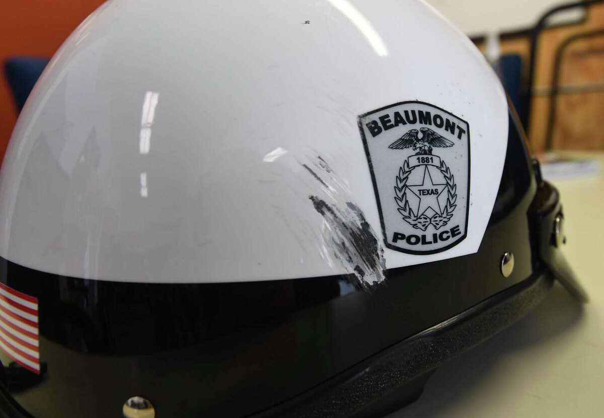 A deep scratch can be seen on the helmet that Beaumont Police Officers Kolin Burmaster's wore when he was involved in a motorcycle accident last December. After months of recovery, Burmaster returns to regular patrol today. Photo taken Tuesday, 2/26/19