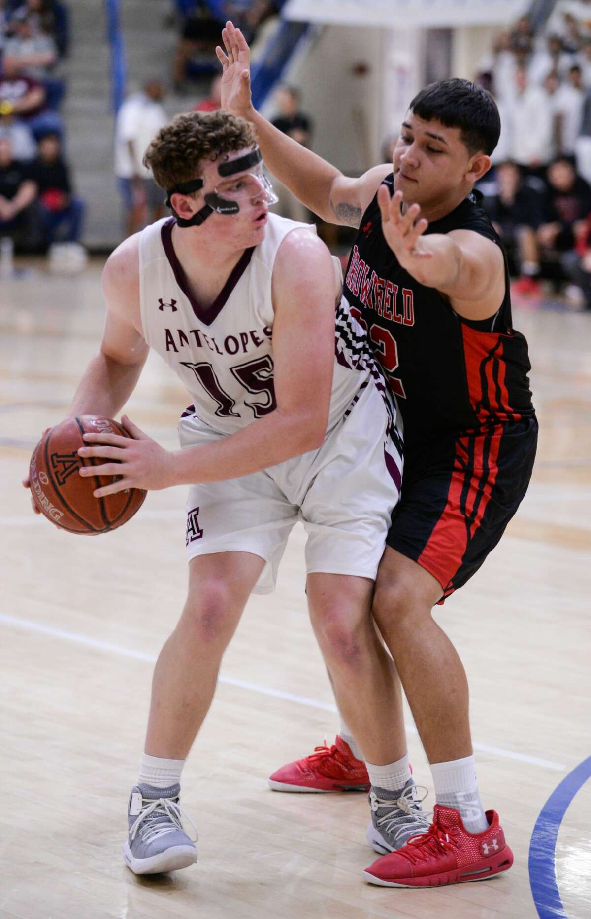 Abernathy's Miles Keith (15) looks for an open teammate from outside the 3-point line during the Region 1 3A regional quarterfinal game against Brownfield Tuesday, Feb. 26, 2019 at Rip Griffin Center in Lubbock, TX. Brownfield defeated Abernathy 71-43.