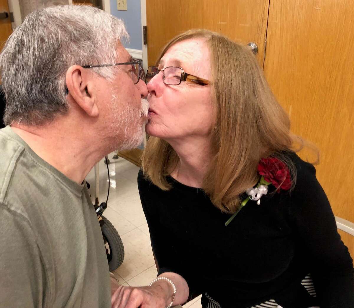 The love remains strong for Pete and Gerry Lukovits, who share a kiss during the festivities.