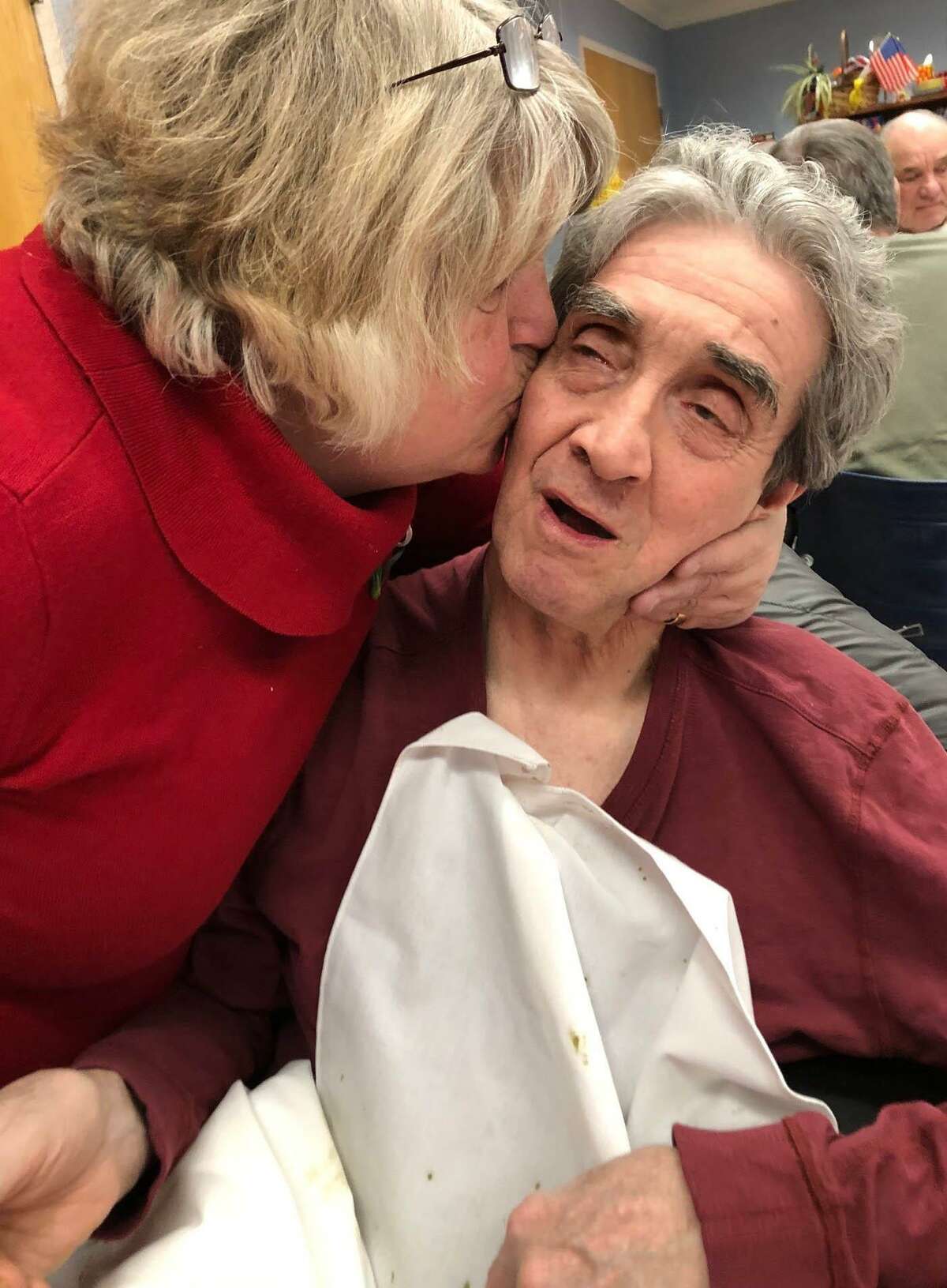 Spectrum/ Candlewood Valley Health and Rehabilitation Center in New Milford recently celebrated Valentine’s Day by hosting a lunch for couples. Several residents and their loved one attended the event that featured a special meal, music with harpist Candace Coates and flowers by Ruth Chase Flowers. Feb. 14, 2019. Lorraine Burns give her husband Burnsey a kiss after their lunch together. Courtesy of Candlewood Valley Health & Rehabilitation Center