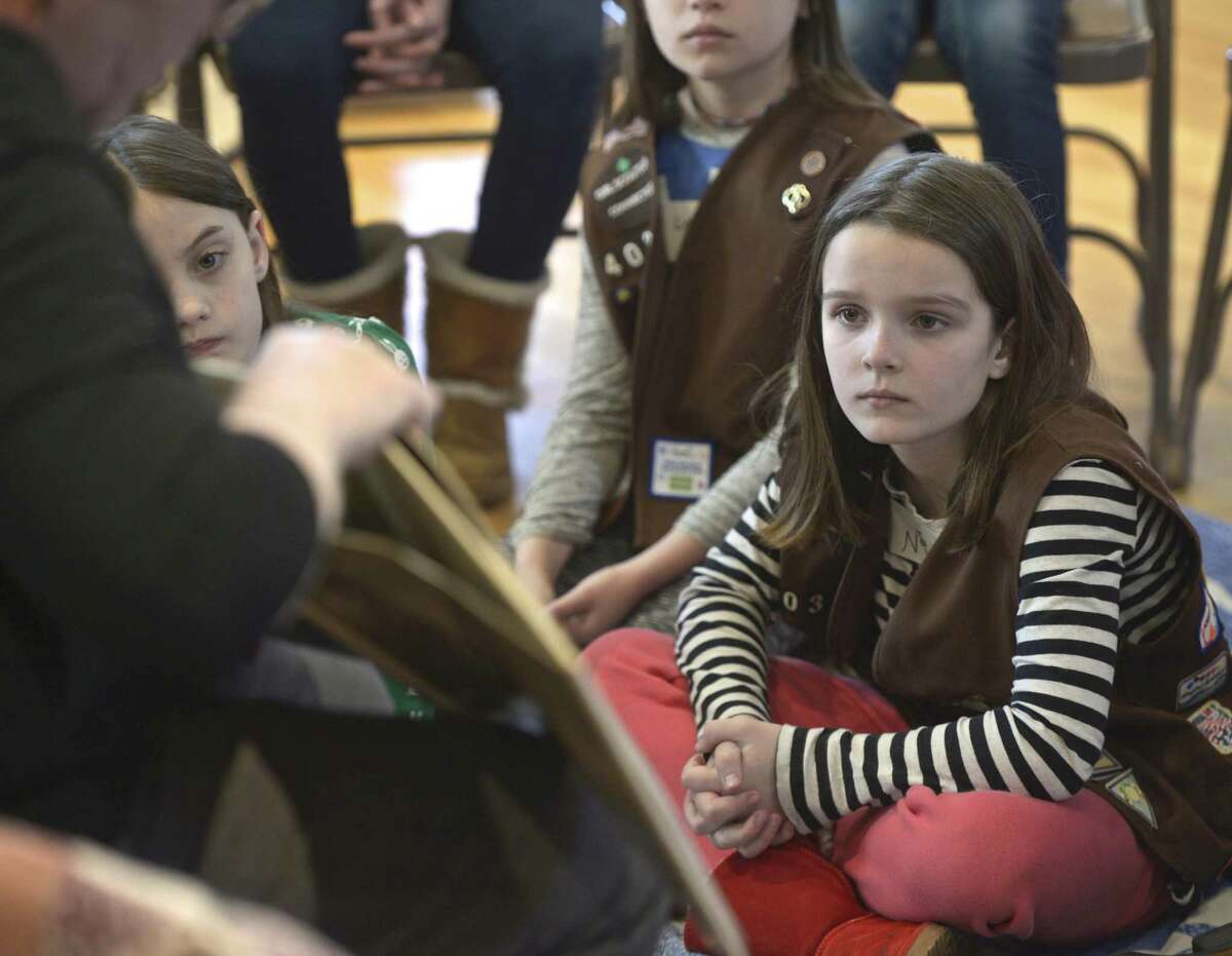 Nia Evans, of Brownie Troop 40324 of New Milford, listens to an Underground Railroad presentation at the New Milford Historical Society & Museum, which hosted a program for second- to fifth-graders on the Underground Railroad and the role New Milford played.