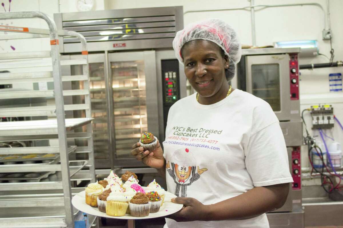 Joann Poe, the owner of NYC's Best Dressed Cupcakes, has received four loans from Grameen America. This microfinance organization provides small-dollar loans to women entrepreneurs, and it recently opened a Houston location.