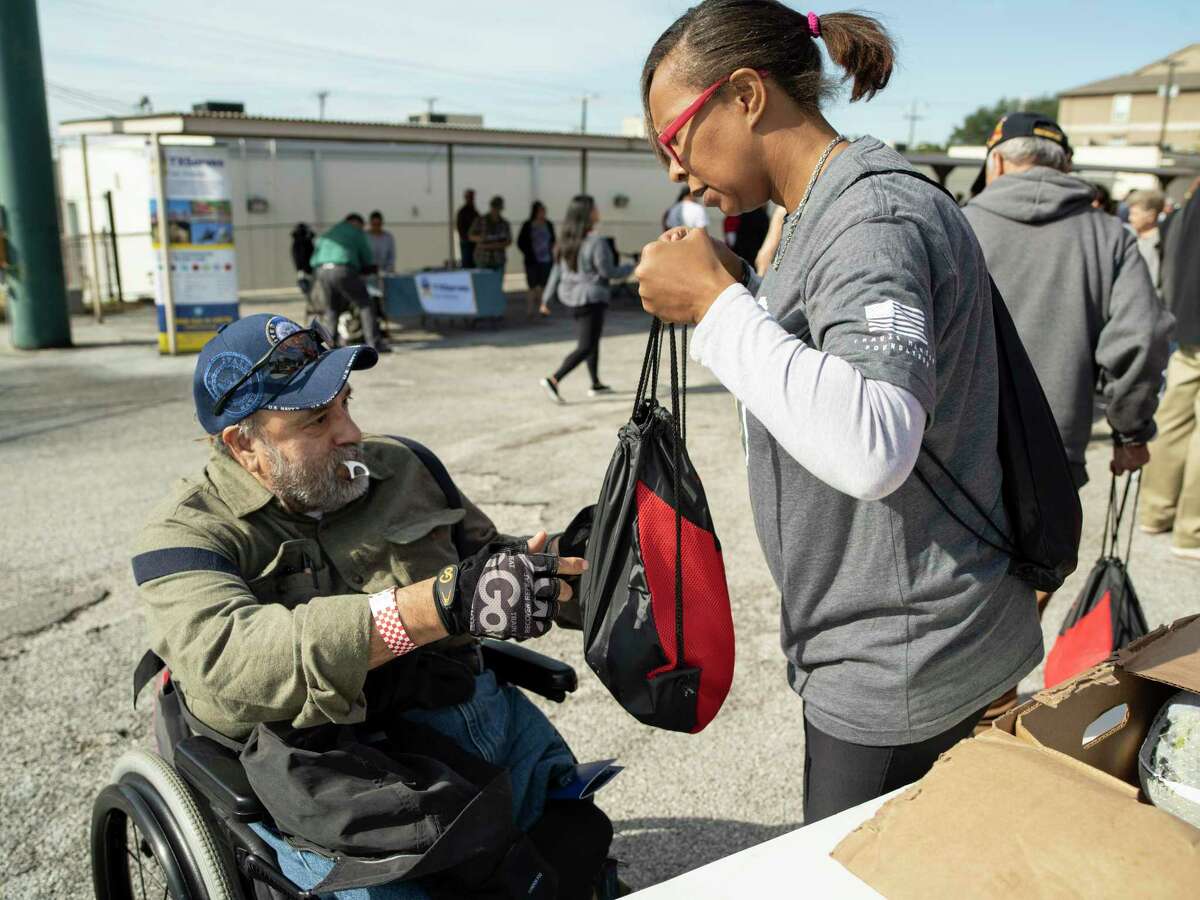This was the scene last year when Robert Lopez, a Navy veteran from the Vietnam era, received a frozen turkey from volunteer Delores Rawls, an Army veteran. Be kind. Do good. Give thanks.