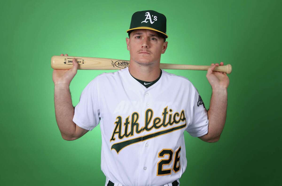 A’s Matt Chapman swings away, close to playing defense