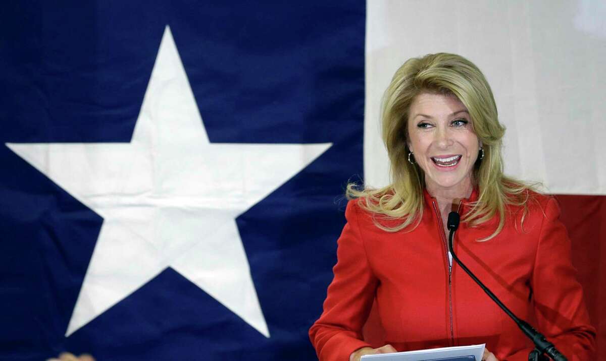 File - In this March 4, 2014 file photo, Texas Sen. Wendy Davis, D-Fort Worth, speaks to supporters at her campaign headquarters, in Fort Worth, Texas. Davis announced this week that she will run against U.S. Rep. Chip Roy. AP Photo/LM Otero, File)
