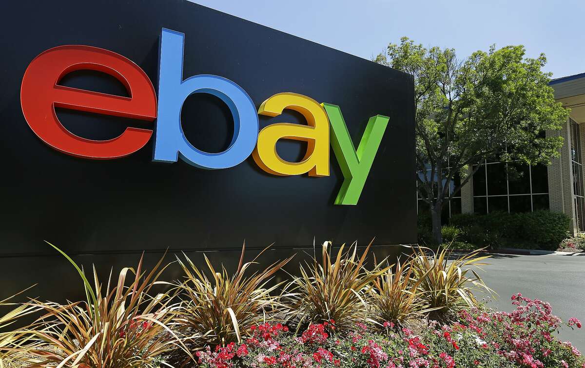 FILE - This Tuesday, July 16, 2013, file photo shows signage at eBay headquarters in San Jose, Calif. EBay is initiating review concerning the future of its StubHub and its classified ads business. The e-commerce company said Friday, March 1, 2019 that there’s no guarantee that the review will result in a sale, spin-off or other business combination involving its assets. (AP Photo/Ben Margot, File)
