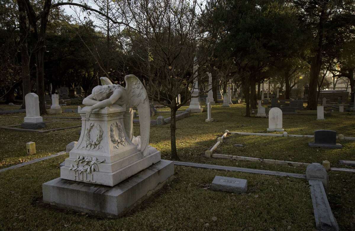 The sun rises over Glenwood Cemetery, Friday, Jan. 25, 2019, in Houston.