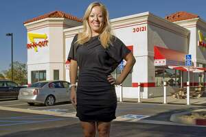 RANCHO SANTA MARGARITA, CA - FEBRUARY 13: In-In-Out Burger CEO Lynsi Torres shown outside the new restaurant in Rancho Santa Margarita, Calif. on Wednesday, February 13, 2013.    ///ADDITIONAL INFORMATION: inNout ?Ãª 2/13/13 ?Ãª LEONARD ORTIZ, ORANGE COUNTY REGISTER ?Ãª   ?Ãª Lynsi Torres, the CEO, President, and first granddaughter to In-N-Out will be at the grand opening of the In-In-Out in Rancho Santa Margarita, Calif.. Torres, the 30-year-old was recently named the youngest female billionaire in the U.S. (Photo by Leonard Ortiz/Digital First Media/Orange County Register via Getty Images)