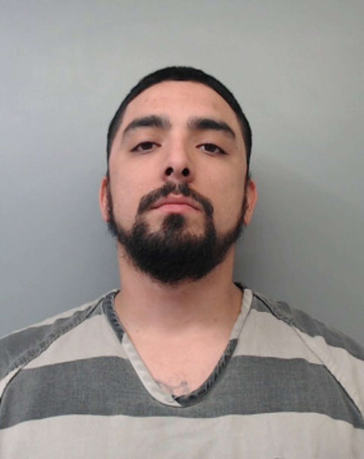 Justin Sanchez, 28, was charged with two counts of injury to a child. Sanchez was also served an arrest warrant that charged him with theft in a separate incident.