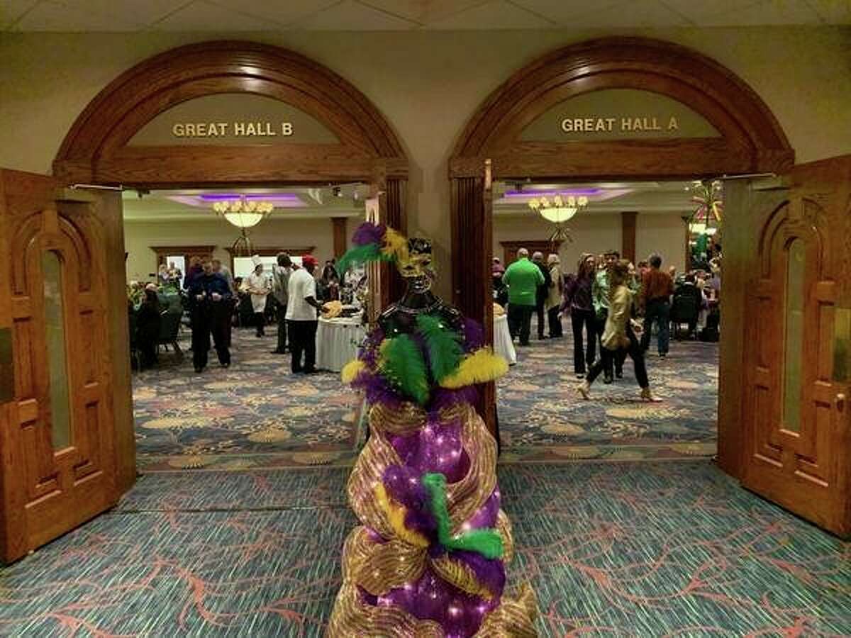 Patrons enjoy a Mardi Gras-themed dinner during The Legacy Center for Community Success' annual fundraiser on Feb. 28, 2019, Great Hall Banquet & Convention Center, in Midland. (Mitchell Kukulka/Mitchell.Kukulka@mdn.net)