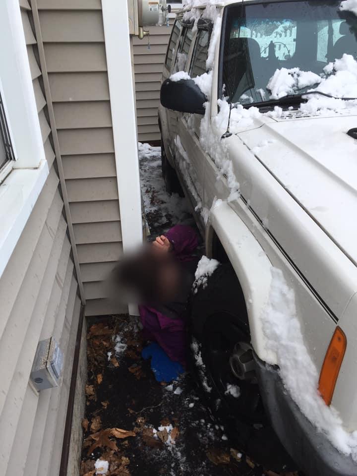 East Haven Firefighters Rescue Woman Trapped Between Car, House