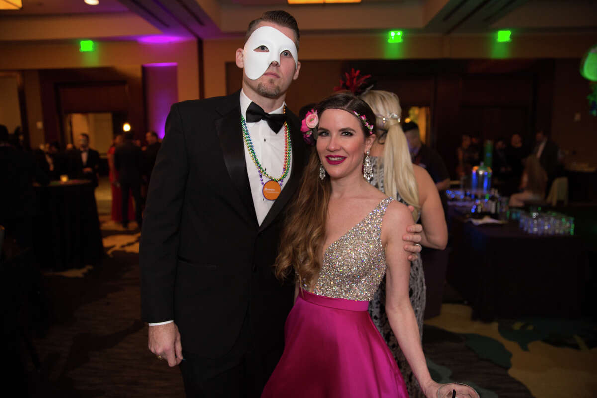 Formal attire, masks and beads set the tone for the Mardi Gras-themed Royal Masquerade Gala on Friday, March 1, at the Hyatt Regency.