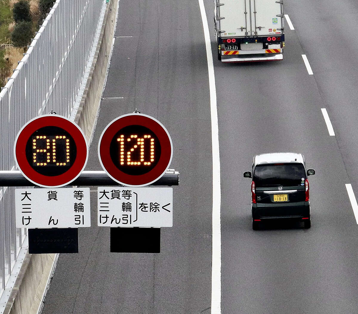 An expressway sign indicates a speed limit of 120 kph on the Shin-Tomei Expressway in Shizuoka Prefecture, Japan on Friday.