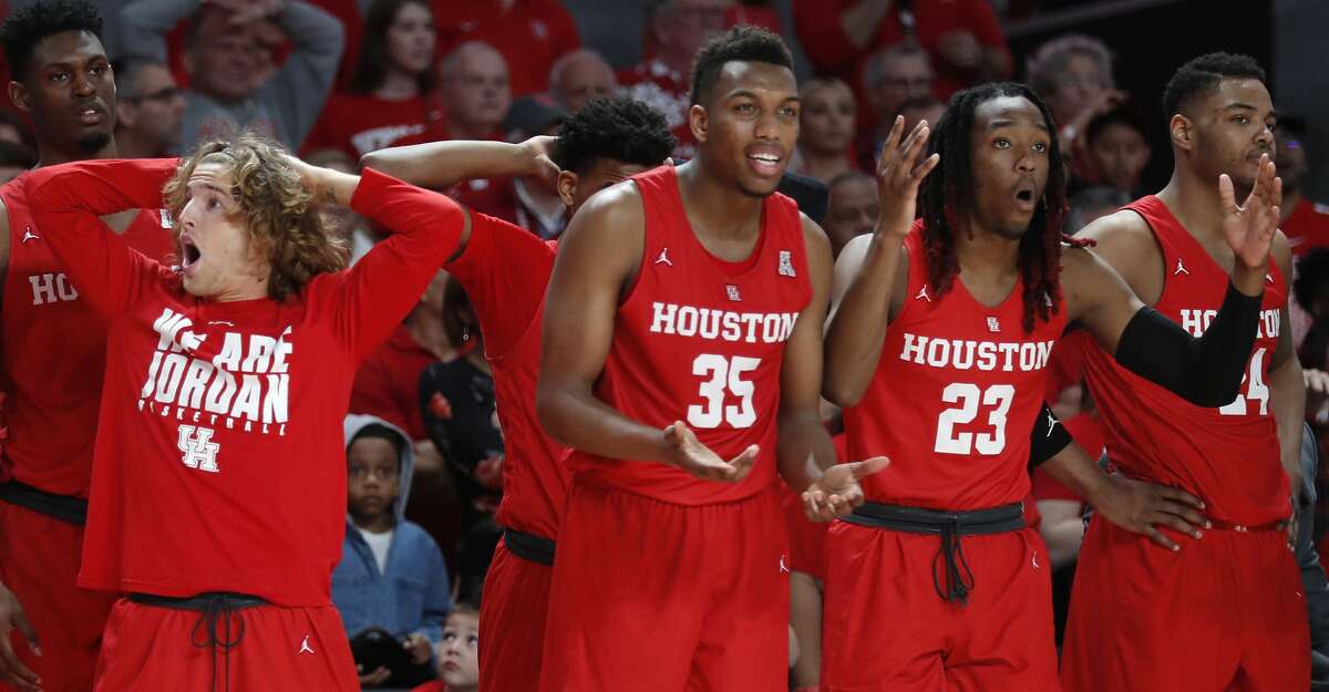 Houston guard Landon Goesling, left, forward Fabian White Jr. (35) forward Cedrick Alley Jr. (23) and forward Breaon Brady (24) react to a call during the second half on an NCAA basketball game against Central Florida at Fertitta Center on Saturday, March 2, 2019, in Houston.